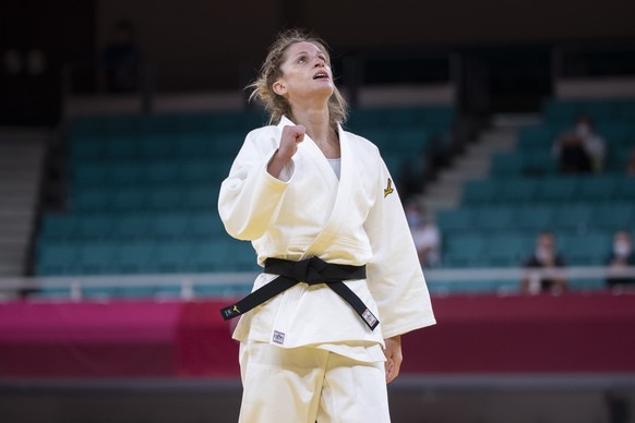Fabienne Kocher of Switzerland Reacts after winning against Sosorbaram Lkhagvasuren of Mongolia during the women's judo -52kgl competition at the 2020 Tokyo Summer Olympics in Tokyo, Japan, on Sunday, ...