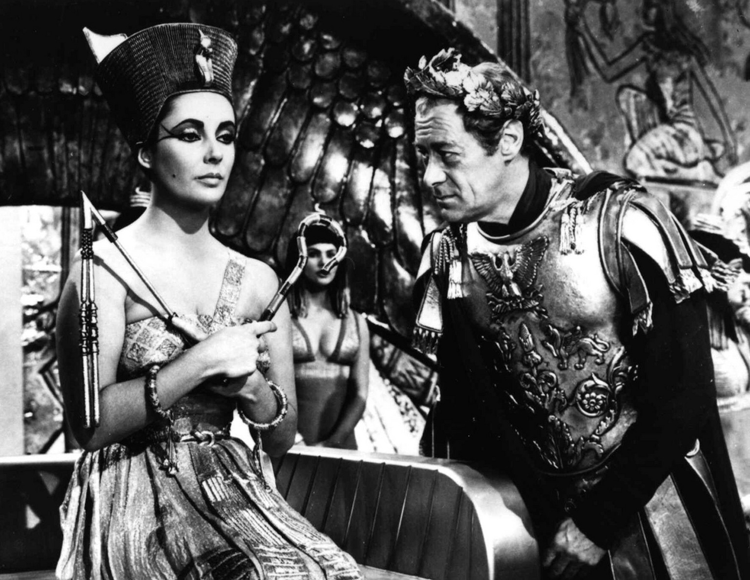 Elizabeth (Liz) Taylor and Rex Harrison appear in a scene from the 1961 film &quot;Cleopatra.&quot; Taylor, 70, has gone through eight marriages and eight divorces, including two of each with the late ...