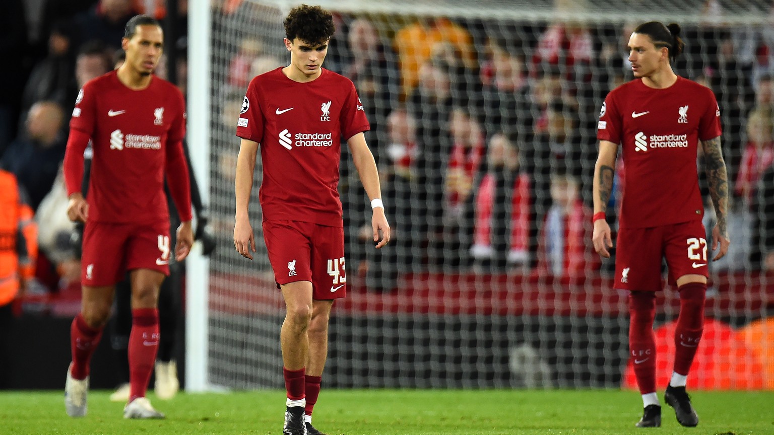 epa10482603 Stefan Bajcetic (C) of Liverpool and teammates react after Real Madrid scored their third goal during the UEFA Champions League, Round of 16, 1st leg match between Liverpool FC and Real Ma ...