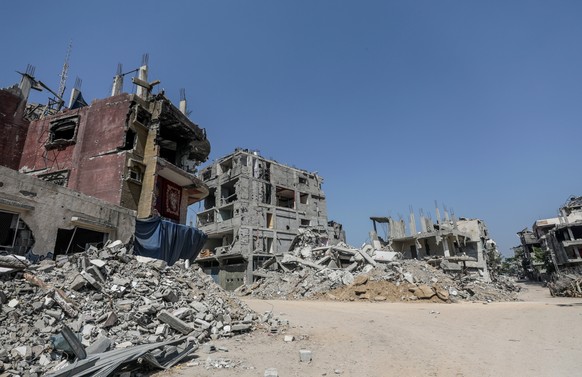 epa11391021 A view of sestroyed buildings during an Israeli military operation in Al Bureij refugee camp, central Gaza Strip, 05 June 2024. The Israeli military stated on 05 June that Israeli troops s ...