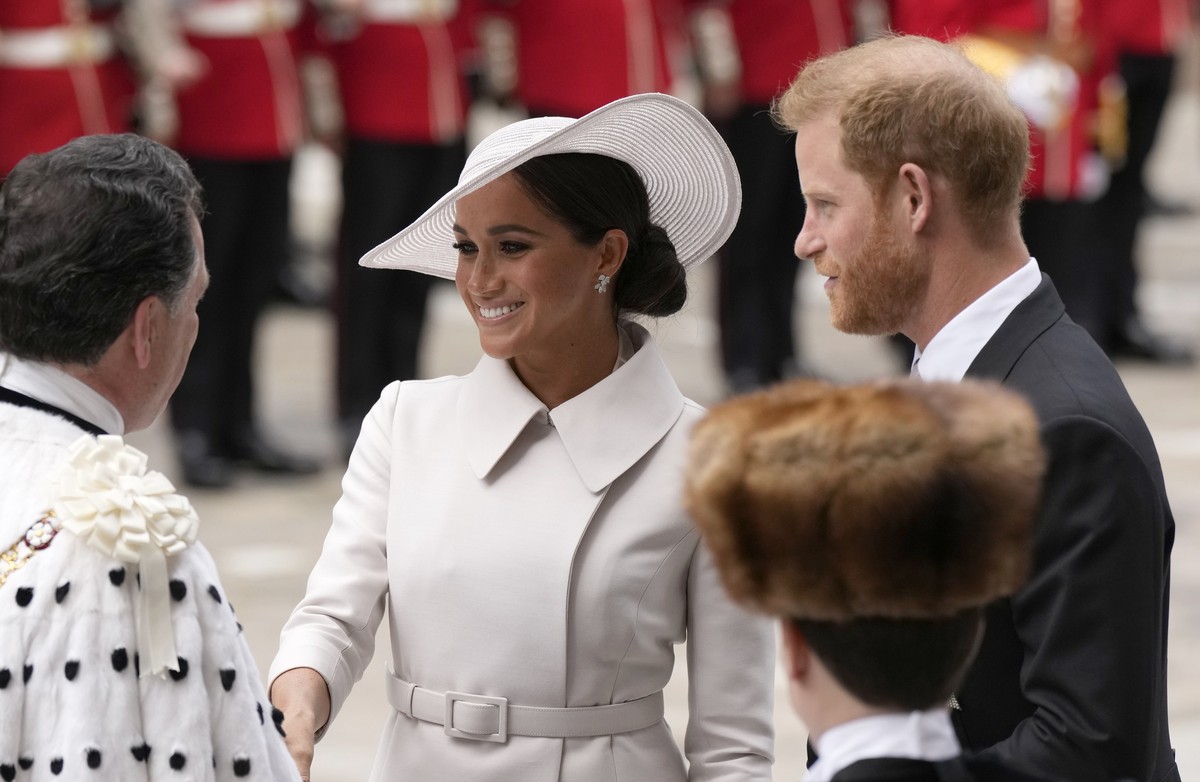 Prince Harry and Meghan Markle, Duke and Duchess of Sussex arrive for a service of thanksgiving for the reign of Queen Elizabeth II at St Paul's Cathedral in London, Friday, June 3, 2022 on the s ...