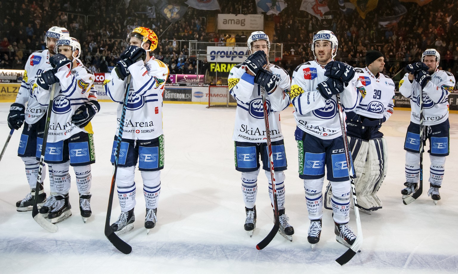 Ambri-Piotta&#039;s players looks on disappointed after losing against Fribourg, during the game of National League A (NLA) Swiss Championship between HC Fribourg Gotteron and Ambri-Piotta, at the ice ...