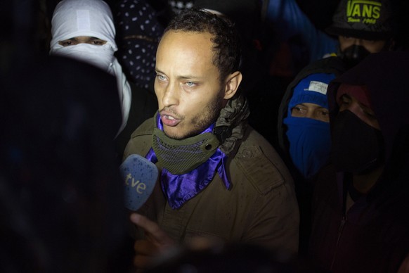 FILE - In this July 13, 2017 file photo, Oscar Perez speaks to the press at a night vigil to honor the more than 90 people killed during three months of anti-government protests, in Caracas, Venezuela ...