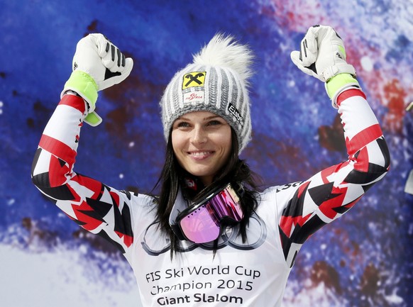 Anna Fenninger of Austria celebrates on the podium after winning the women&#039;s giant slalom race at the Alpine Skiing World Cup Finals in Meribel, in the French Alps, March 22, 2015 REUTERS/Robert  ...