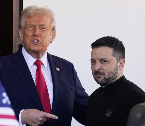 President Donald Trump welcomes Ukraine President Volodymyr Zelenskyy at the White House in Washington, Friday, Feb. 28, 2025. (AP Photo/Ben Curtis)
Trump 100 Days