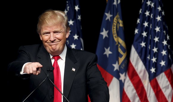 Republican U.S. presidential candidate Donald Trump speaks at a campaign rally at the Georgia World Congress Center in Atlanta, Georgia February 21, 2016. REUTERS/Tami Chappell