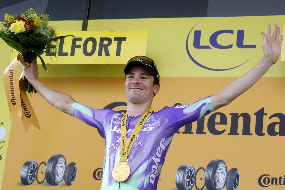 epa13117516 Swiss cyclist Mauro Schmid of Team Jayco AlUla celebrates on the podium after winning Stage 13 of the Tour de France, a 205.8 km route from Dole to Belfort, France, 17 July 2026. EPA/GUILL ...