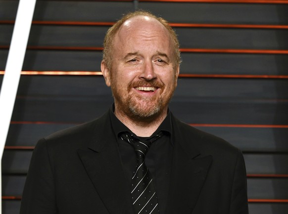 FILE - Louis C.K. appears at the Vanity Fair Oscar Party in Beverly Hills, Calif., on Feb. 28, 2016. The comedian-actor is nominated for best comedy album for �??Sincerely Louis CK,&quot; a comeback a ...