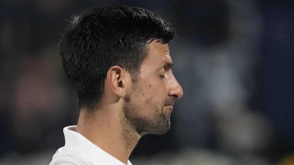Serbia's Novak Djokovic reacts after lost a point against Czech Republic's Jiri Vesely during a quarterfinal match of the Dubai Duty Free Tennis Championship in Dubai, United Arab Emirates,  ...