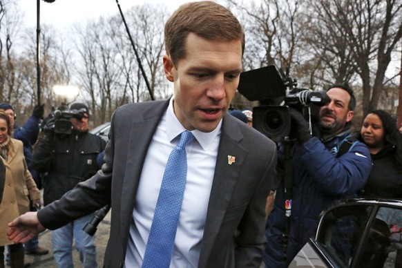 Conor Lamb, the Democratic candidate for the special election in Pennsylvania&#039;s 18th Congressional District, makes his way through a crowd of media after voting in Mount Lebanon, Pa., Tuesday, Ma ...