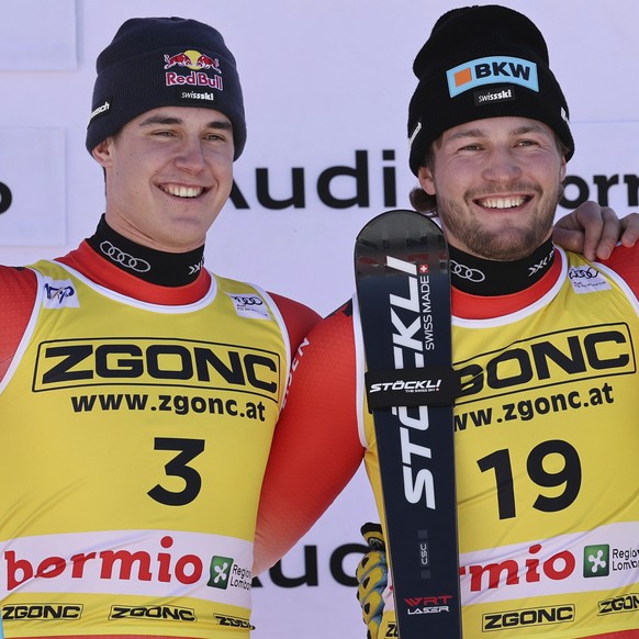 From left, second placed Switzerland&#039;s Franjo von Allmen, the winner Switzerland&#039;s Alexis Monney and third placed Canada&#039;s Cameron Alexander celebrate after an alpine ski, men&#039;s Wo ...