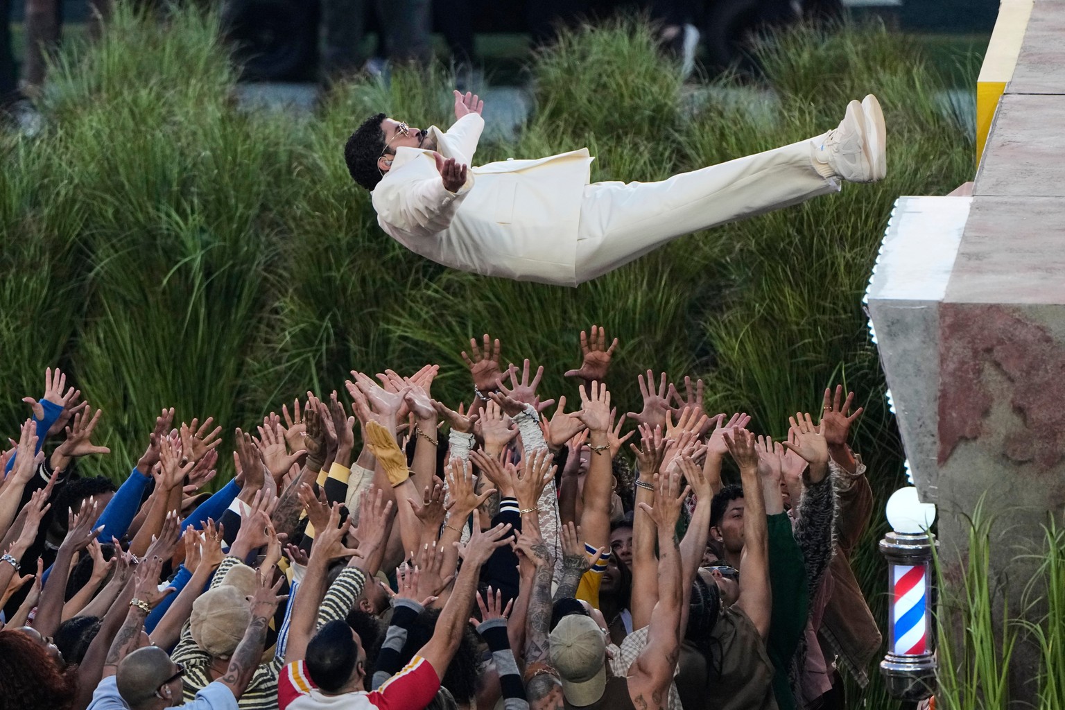 Bad Bunny performs during halftime of the NFL Super Bowl 60 football game between the New England Patriots and the Seattle Seahawks, Sunday, Feb. 8, 2026, in Santa Clara, Calif. (AP Photo/Charlie Ried ...