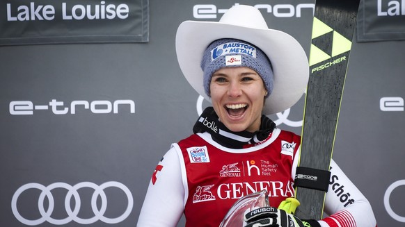 Austria's Nicole Schmidhofer celebrates her win in the women's World Cup downhill ski race, Saturday, Dec. 7, 2019 in Lake Louise, Alberta. (Jeff McIntosh/The Canadian Press via AP)