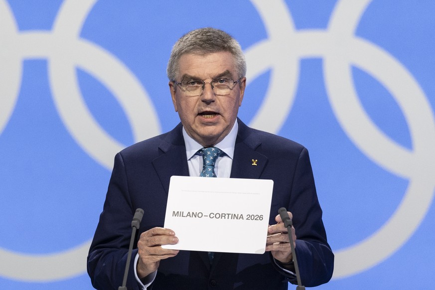 International Olympic Committee (IOC) president Thomas Bach from Germany opens the envelope announcing that MilanÐCortina has won the bid to host the 2026 Winter Olympic Games, defeating the other cad ...