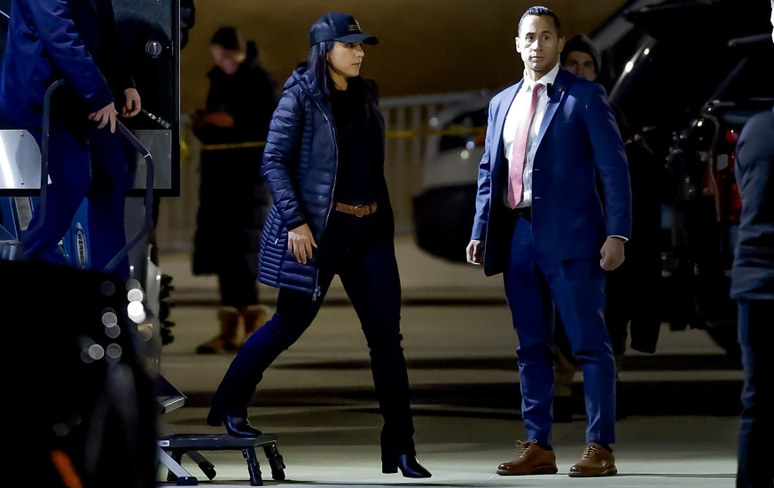 epa12689598 Tulsi Gabbard (L), US Director of National Intelligence, arrives as the FBI conducts a 'court-ordered search warrant' at the Fulton County Department of Registration and Election ...