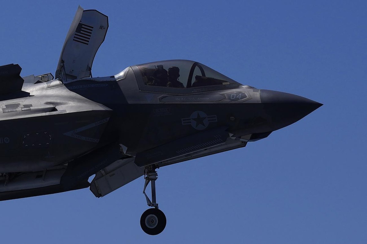 F-35 aircraft prepared for landing on the U.K.'s aircraft carrier HMS Queen Elizabeth in the Mediterranean Sea on Sunday, June 20, 2021. The British Royal Navy commanders say the U.K.'s newe ...