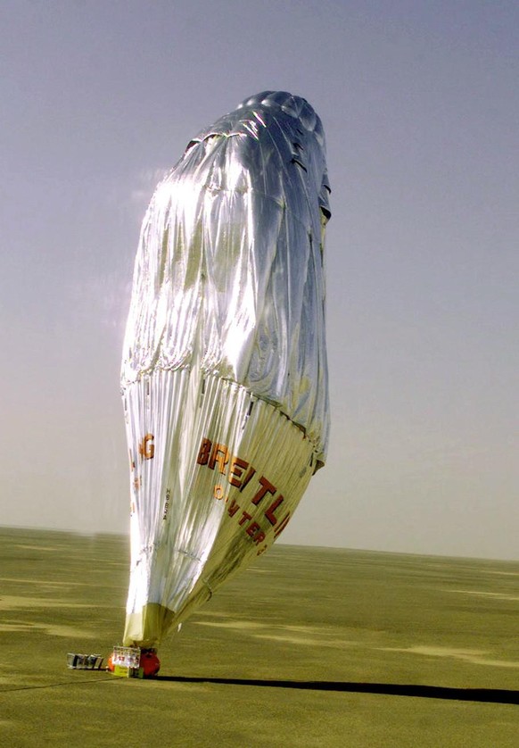 The Breitling Orbiter 3 balloon flies over the Egyptian desert early Sunday, March 21, 1999. Swiss Bertrand Piccard and Briton Brian Jones, the first avaitors to fly a hot air balloon around the world ...