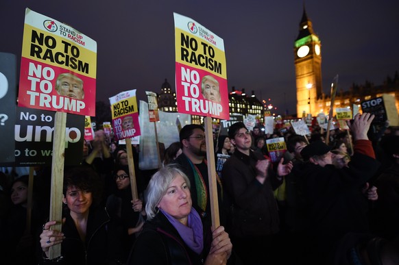 epa05805806 Protesters demonstrate against the proposed State visit to the UK of US President Donald J. Trump, in London, Britain, 20 February 2017. The British Parliament is debating the proposed vis ...