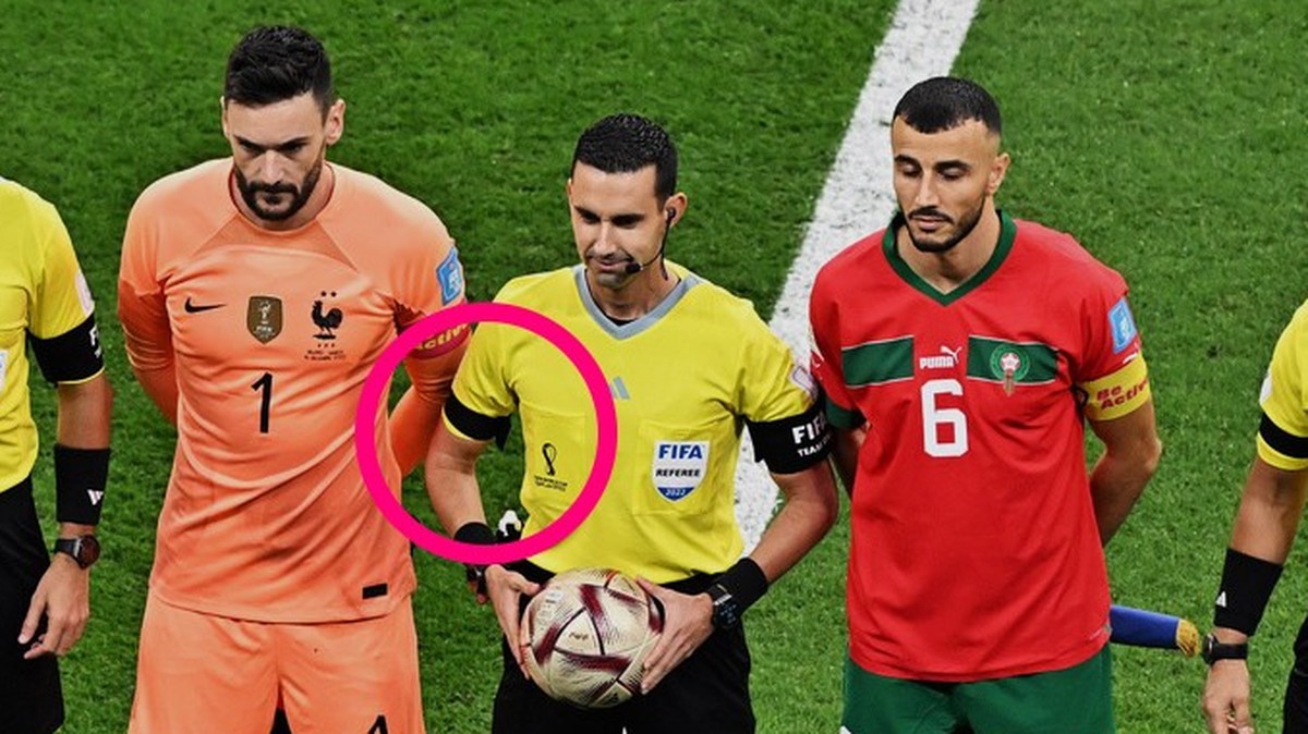 epa10365956 (L-R) Assistant referee Miguel Hernandez, the fourth official Jesus Valenzuela, Hugo Lloris of France, referee Cesar Arturo Ramos, Romain Saiss of Morocco, assistant referee Alberto Morin  ...