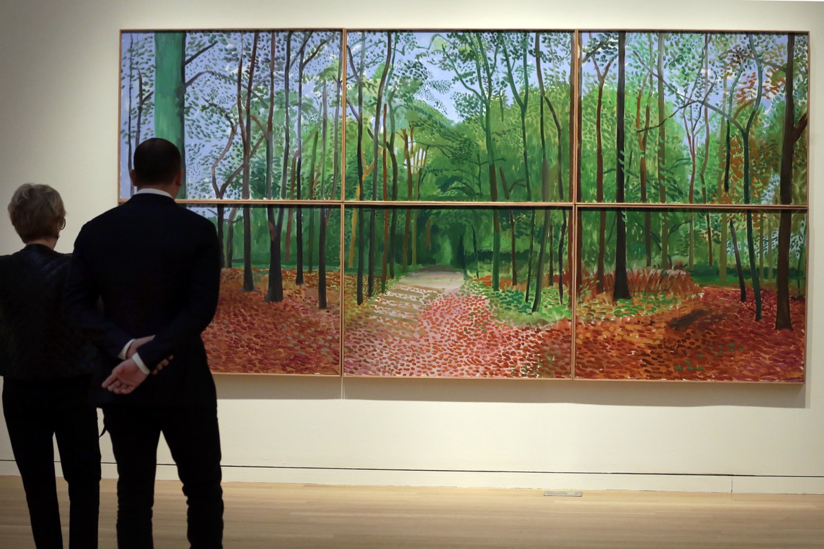 A large-scale landscape by David Hockney titled "Woldgate Woods, 24, 25 and 26 October, 2006" is displayed at Sotheby's, in New York, Friday, Nov. 4, 2016. Sotheby's expects the wo ...