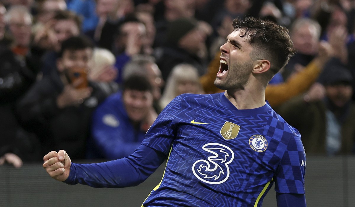 Chelsea's Christian Pulisic celebrates after scoring his side's second goal during the Champions League round of 16, first leg, soccer match between Chelsea and LOSC Lille at Stamford Bridge ...