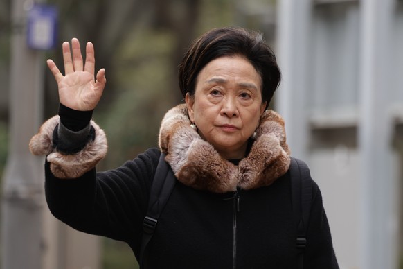 epa12669481 Emily Lau Wai-Hing, former chairperson of the Democratic Party of Hong Kong, enters the West Kowloon Law Courts Building, sitting as the High Court, ahead of the scheduled opening of the n ...