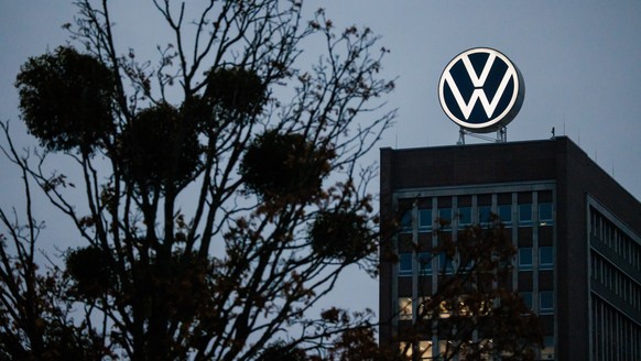 epa11690884 The logo of the automotive company Volkswagen is illuminated on top of a building of the VW factory in Wolfsburg, Germany, 29 October 2024. The German union IG Metall announced their in-ho ...