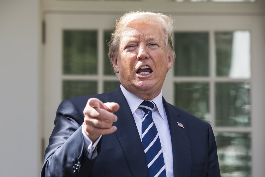 epa06270024 US President Donald J. Trump and Senate Majority Leader Mitch McConnell (not pictured) speak to the media after meeting for lunch at the White House in Washington, DC, USA, 16 October 2017 ...