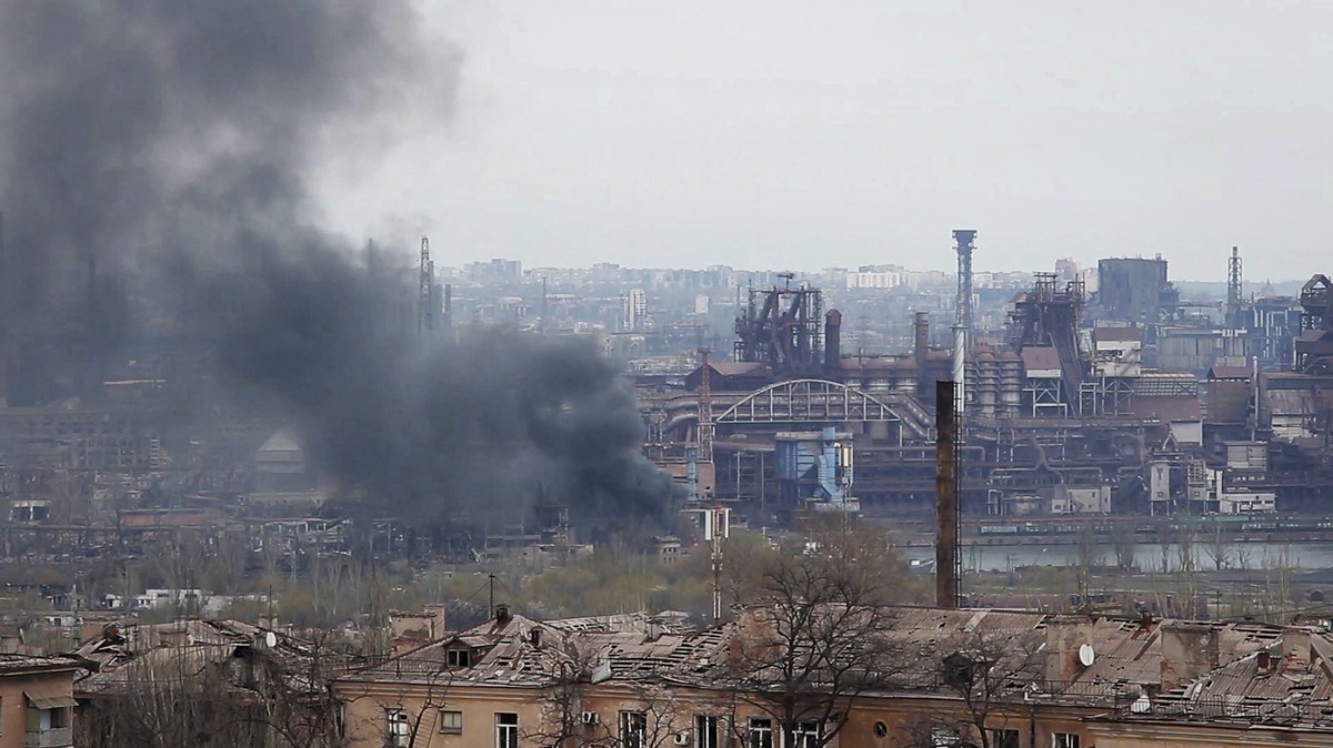 In this photo taken from video smoke rises from the Metallurgical Combine Azovstal in Mariupol, in territory under the government of the Donetsk People's Republic, eastern Ukraine, Tuesday, May 3 ...