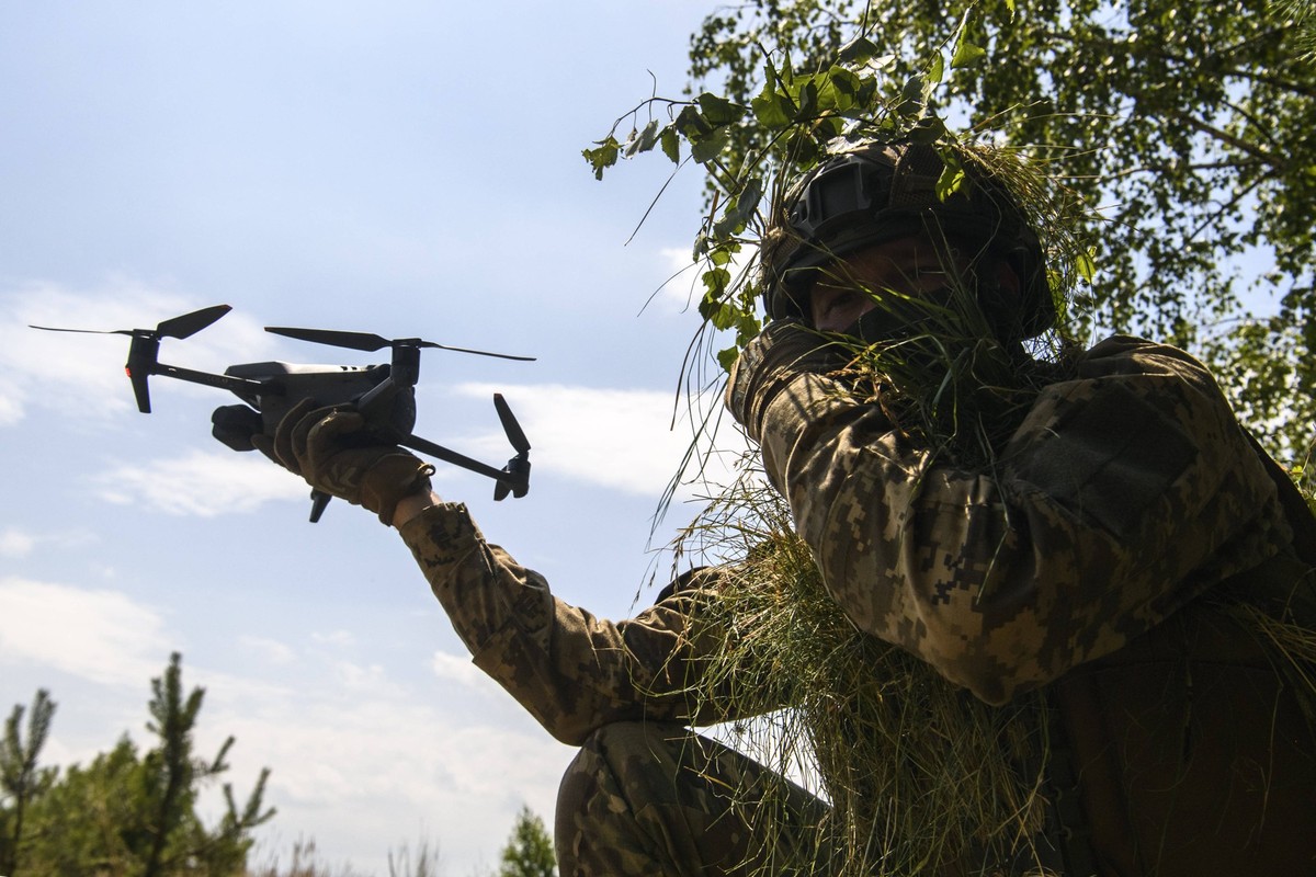 Ukrainian Soldiers Of The 61st Separate Mechanized Brigade During Military Exercises In The Chernihiv Region Ukrainian soldier of the 61st Separate Mechanized Brigade masters aerial reconnaissance usi ...