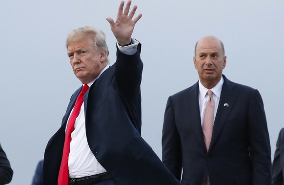 FILE - In this July 10, 2018, file photo, President Donald Trump is joined by Gordon Sondland, the U.S. ambassador to the European Union, second from right, as he arrives at Melsbroek Air Base, in Bru ...