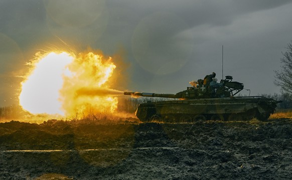 FILE - Ukrainian army fires a captured Russian tank T-80 at the Russian position in Donetsk region, Ukraine, Tuesday, Nov. 22, 2022. The West's move to send tanks to Ukraine was greeted enthusiastical ...