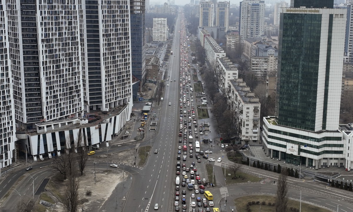Traffic jams are seen as people leave the city of Kyiv, Ukraine, Thursday, Feb. 24, 2022. Russian President Vladimir Putin on Thursday announced a military operation in Ukraine and warned other countr ...