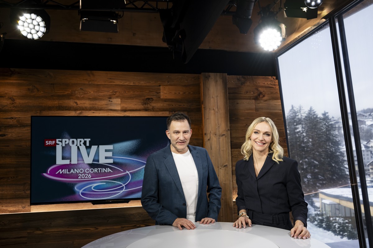 Sascha Ruefer and Annette Fetscherin from SRF pose during a media tour of the SRG SSR studio at the 2026 Olympic Winter Games in Cortina, Italy, on Thursday, February 5, 2026. (KEYSTONE/Jean-Christoph ...