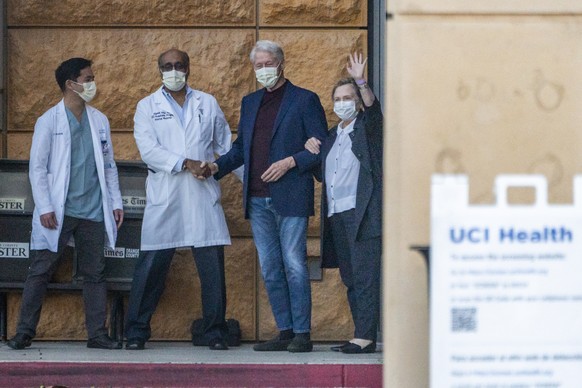 Former President Bill Clinton, and former first lady and former U.S. Secretary of State Hillary Clinton thank members of the medical staff as he is released from the University of California Irvine Me ...