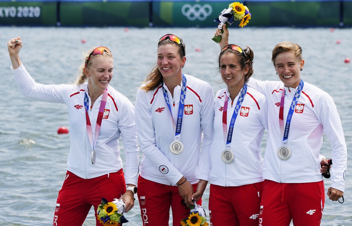 epa09372115 (from left) Agnieszka Kobus-Zawojska, Marta Wieliczko, Maria Sajdak and Katarzyna Zillmann of Poland celebrate winning silver in the Women's Quadruple Sculls final at the Rowing event ...