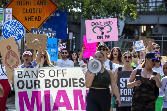 epa10062444 Abortion right activists protest in Downtown Miami, Florida, USA 09 July 2022. On 24 June the US Supreme Court issued a ruling on Dobbs v Jackson Women&#039;s Health Organization, overturn ...