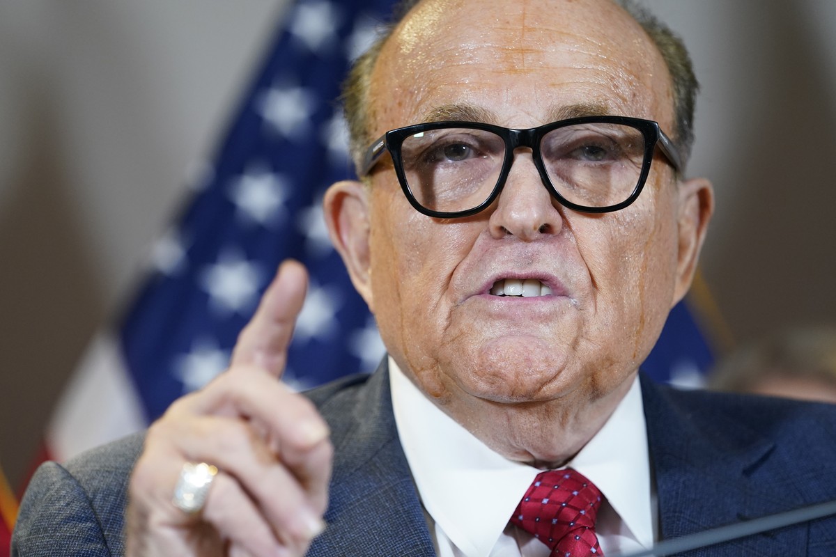 FILE - Former New York Mayor Rudy Giuliani, a lawyer for President Donald Trump, speaks during a news conference at the Republican National Committee headquarters, Nov. 19, 2020, in Washington. A lawy ...