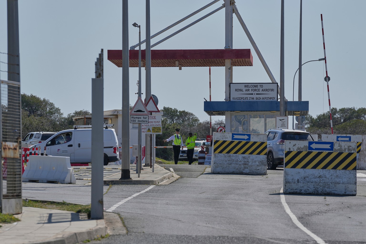 Force Protection personnel secure the main gate of the U.K.'s RAF Akrotiri air base after it was hit by a drone strike early morning near Limassol, Cyprus, Monday, March, 2, 2026. (AP Photo/Petro ...