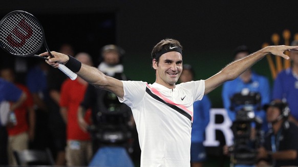 FILE - In this file photo dated Sunday, Jan. 28, 2018, Switzerland's Roger Federer raises his arms after defeating Croatia's Marin Cilic in the men's singles final at the Australian Open tennis championships in Melbourne, Australia. The 36-year-old Federer would become the oldest ever world No. 1, when the new rankings are published upcoming Monday Feb. 19, if he beats leading Dutch player Robin Haase in the ABN AMRO world tennis tournament in Rotterdam.(AP Photo/Dita Alangkara, FILE)