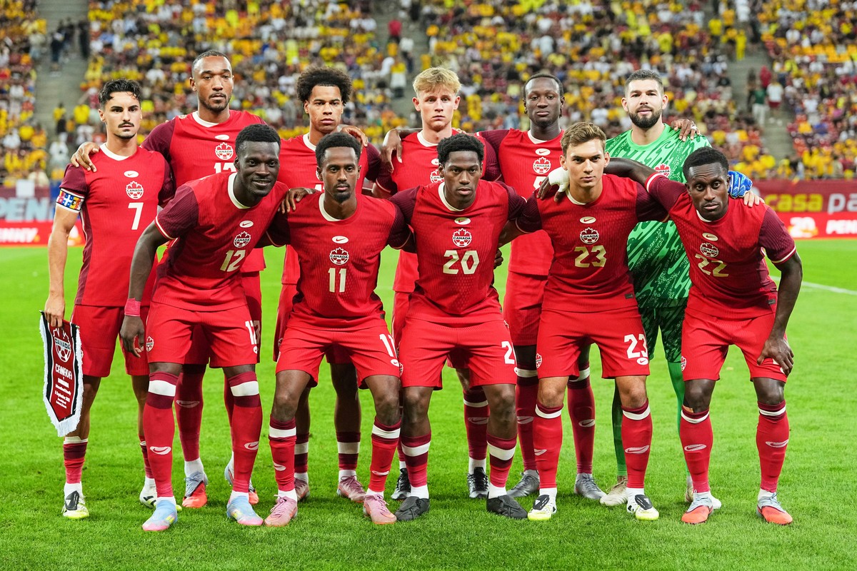 FILE - Canada players pose for the team picture before an international friendly soccer match between Romania and Canada at the National Arena stadium in Bucharest, Romania, Friday, Sept. 5, 2025. (AP ...