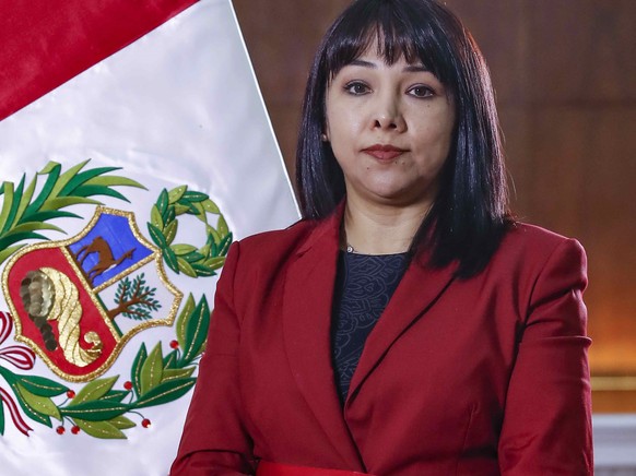 epa09510100 A handout photo made available by the Presidency of Peru that shows the new Peruvian Prime Minister, Mirtha Vasquez, as she poses in Lima, Peru, 06 October 2021. EPA/Presidency of Peru HAN ...