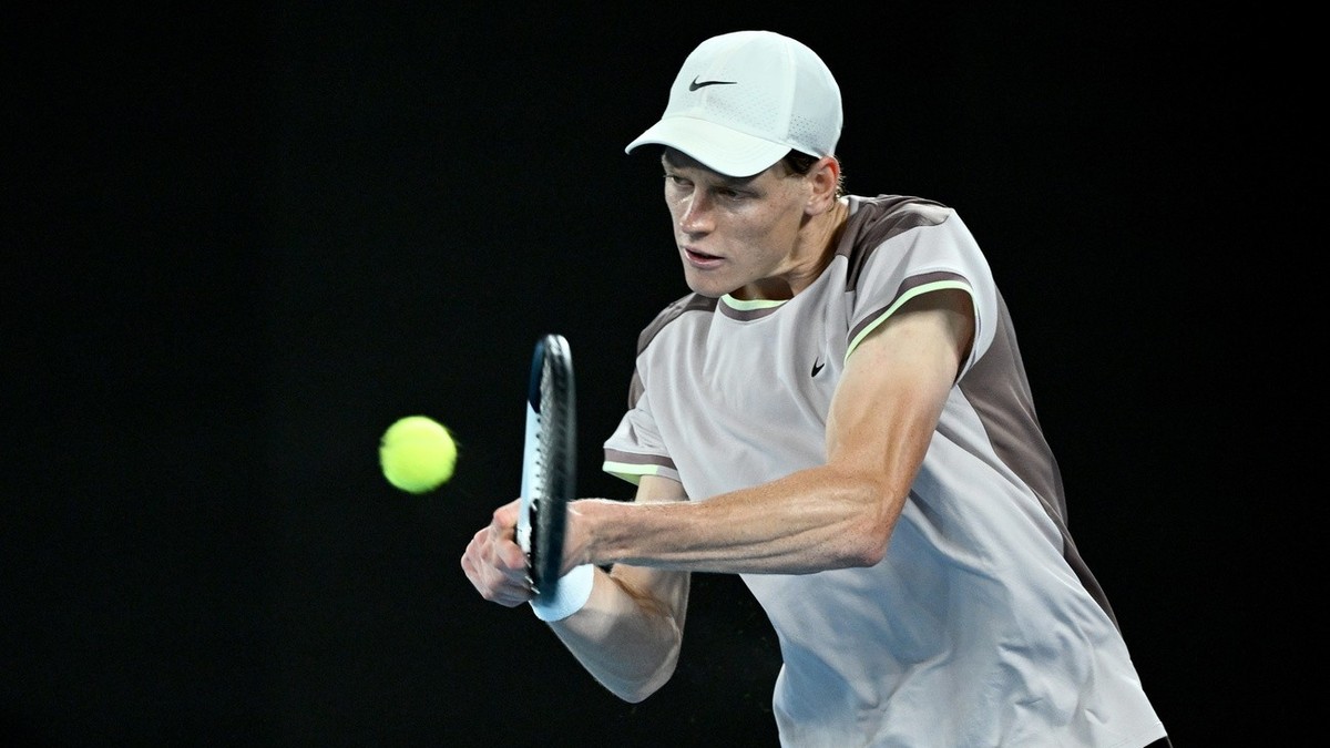 epa11110169 Jannik Sinner of Italy in action during the Men's Singles final against Daniil Medvedev of Russia on Day 15 of the Australian Open tennis tournament in Melbourne, Australia, 28 Januar ...