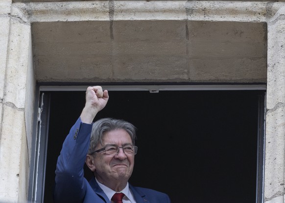 epa11465934 Jean-Luc Melenchon leader of La France Insoumise (LFI) reacts after the announcement of the results of the second round of the legislative elections in Paris, France, 07 July 2024. France  ...
