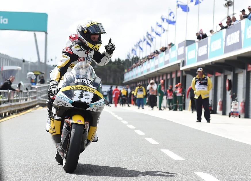 epa05598736 Thomas Luethi of Switzerland for Garage Plus Interwetten reacs as he wins the Moto2 class race during the 2016 Australian MotoGP at Phillip Island, Victoria, Australia, 23 October 2016. EP ...