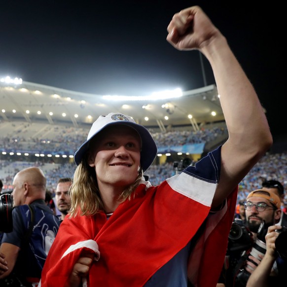 epa10684523 Manchester City player Erling Haaland celebrates after the team won the UEFA Champions League Final soccer match between Manchester City and Inter Milan, in Istanbul, Turkey, 10 June 2023. ...