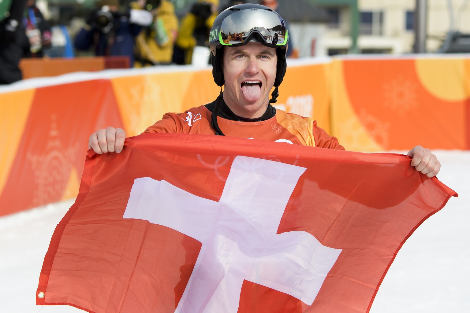 Gold medal winner Nevin Galmarini of Switzerland reacts during the Men Snowboard Parallel Giant Slalom Finals in the Phoenix Snow Park during the XXIII Winter Olympics 2018 in Pyeongchang, South Korea ...