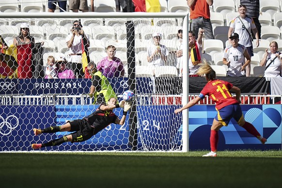 Germany&#039;s goalkeeper Ann-Katrin Berger stops a penalty by Spain&#039;s Alexia Putellas, right, during the women&#039;s bronze medal soccer match between Spain and Germany, at the Lyon stadium, du ...
