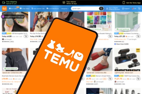 Temu logo online marketplace ecommerce on a smartphone and computer Stuttgart, Germany - May 1, 2024: Temu logo online marketplace ecommerce on a smartphone and computer in Stuttgart, Germany. Copyrig ...