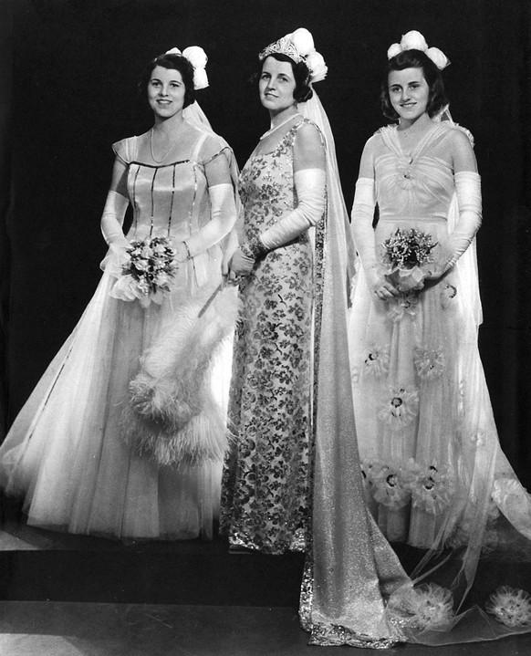 Mrs Kennedy and her deb daughters Mrs Joseph Kennedy, wife of H.E. the United States Ambassador, in a photograph to mark the presentation of two of her daughters at the first court at Buckingham Palac ...